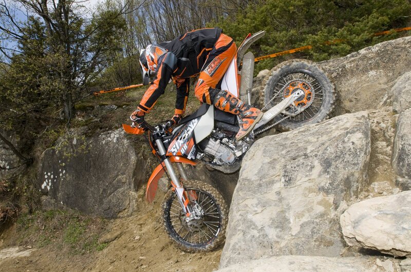 Motocross rider on rocky terrain