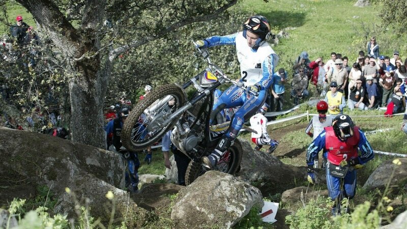 Motocross rider on rocky terrain