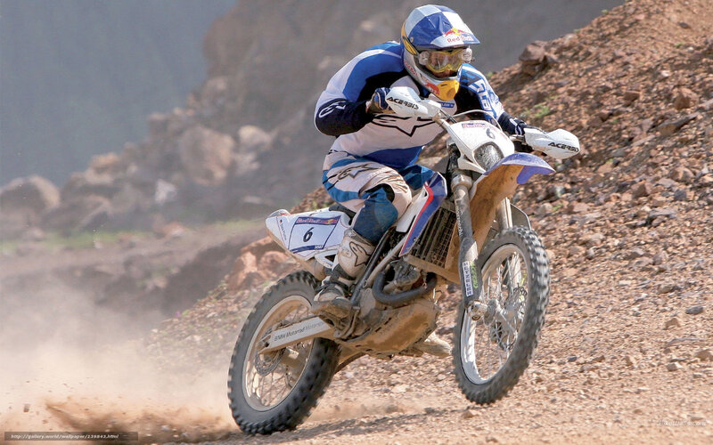 Motocross rider on rocky terrain