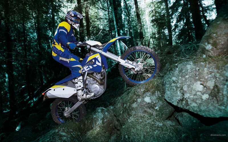 Motocross rider on rocky trail