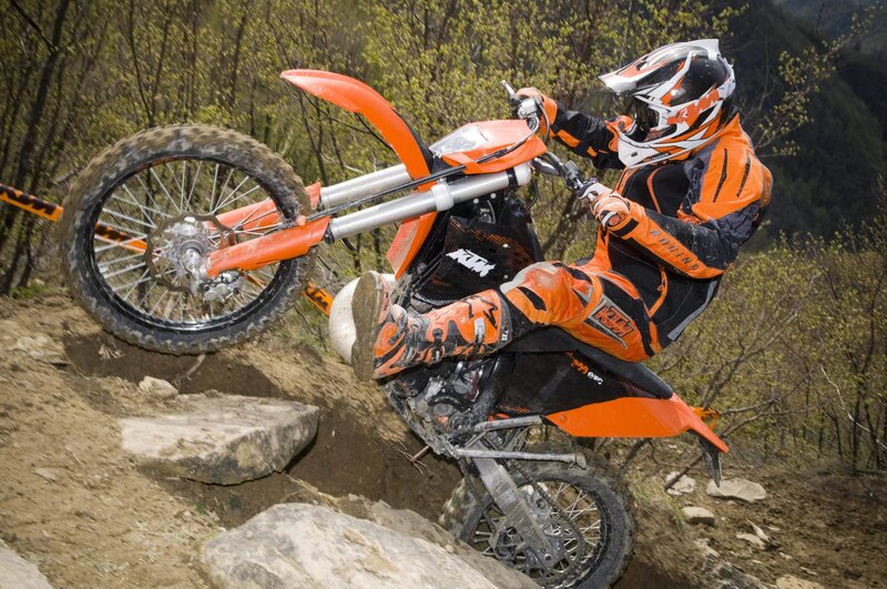 Motocross rider on rocky trail