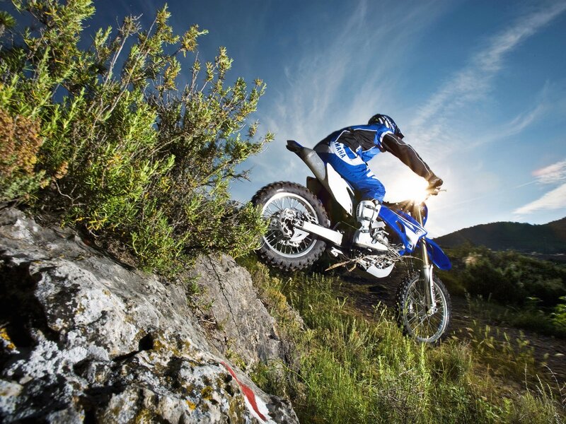 Motocross rider on rocky trail