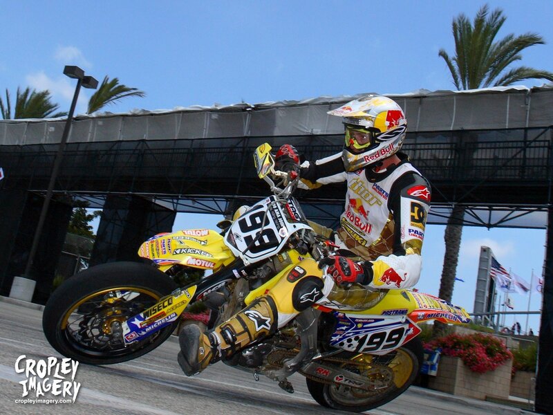 motocross rider on yellow bike
