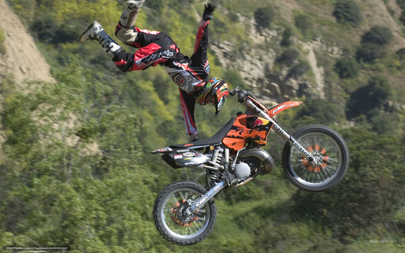 Motocross rider performing stunt