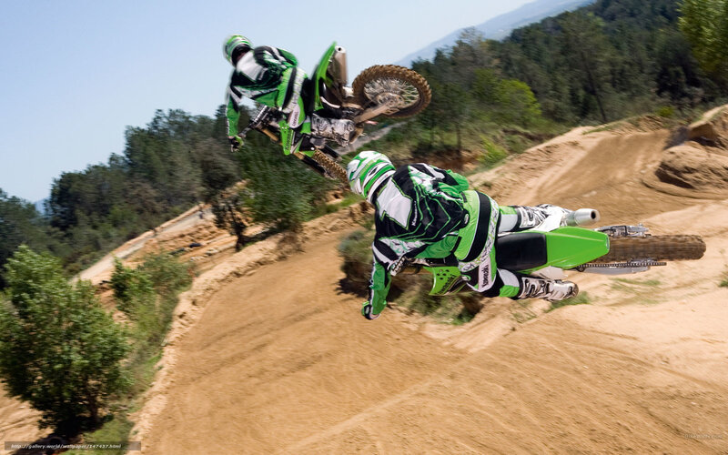 Motocross Riders in Mid-air — Green