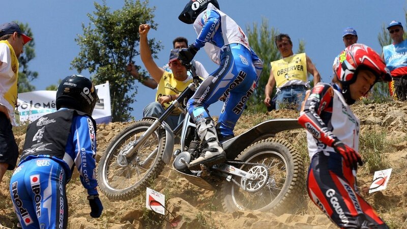 Motocross riders on a dirt track