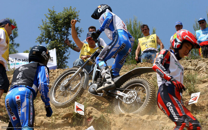 Motocross riders on a dirt track