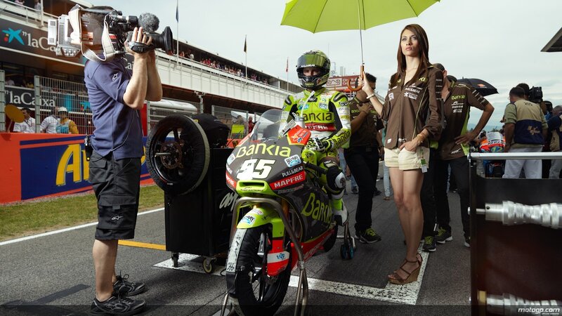 MotoGP rider with bike and model