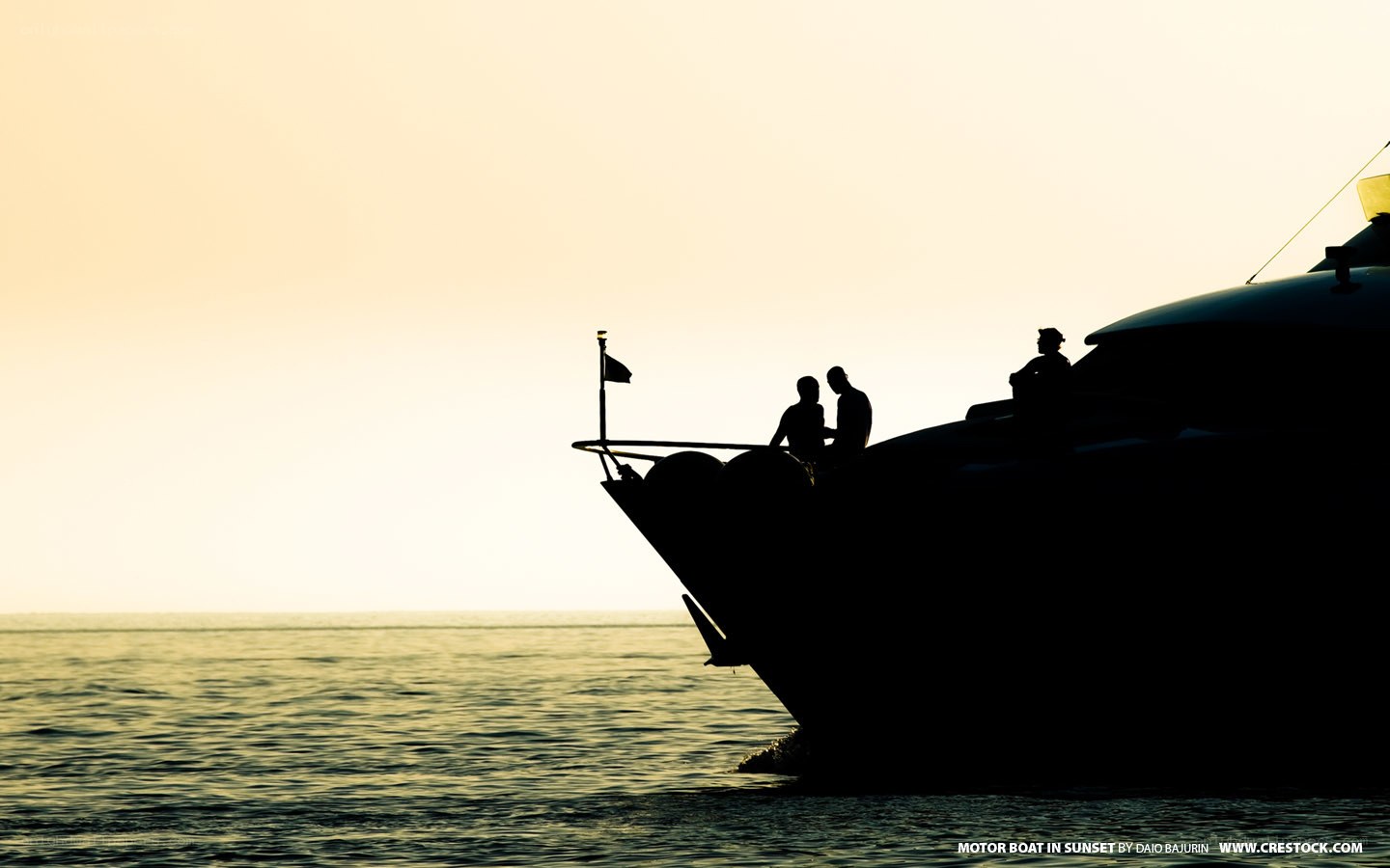 Motor boat at sunset
