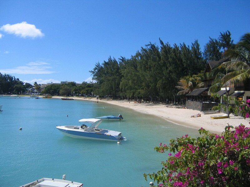 Motorboat in Turquoise Water — Blue, Serene, Afternoon