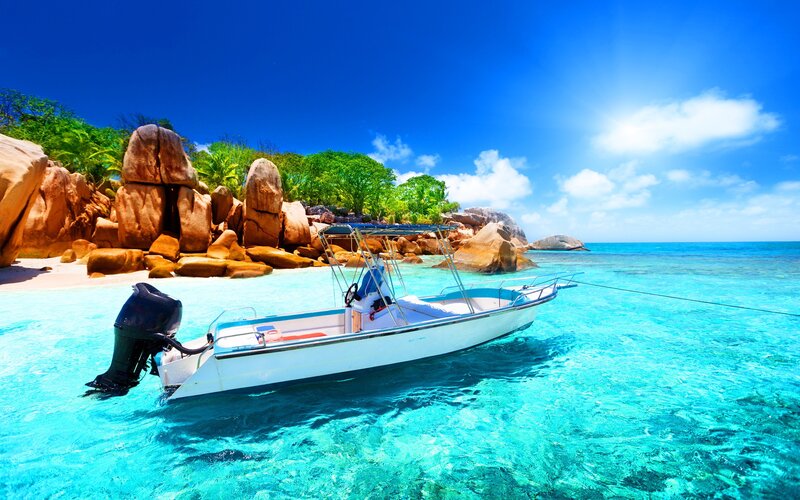 Motorboat in Turquoise Water — Blue, Serene