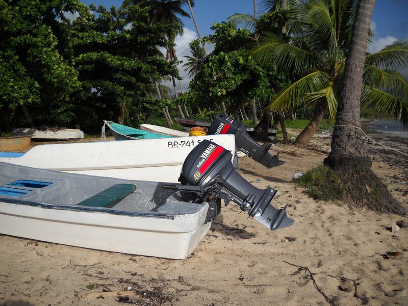 Motorboats on Beach — White