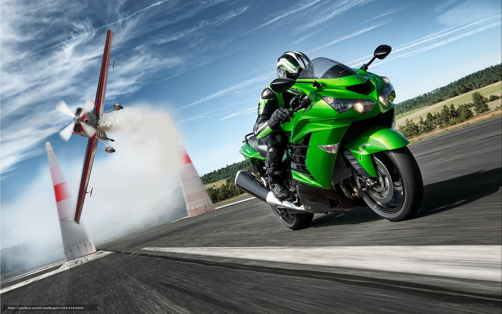 Motorcycle and airplane on a runway
