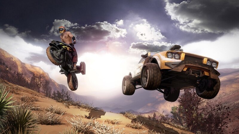 Motorcycle and car in mid-air jump