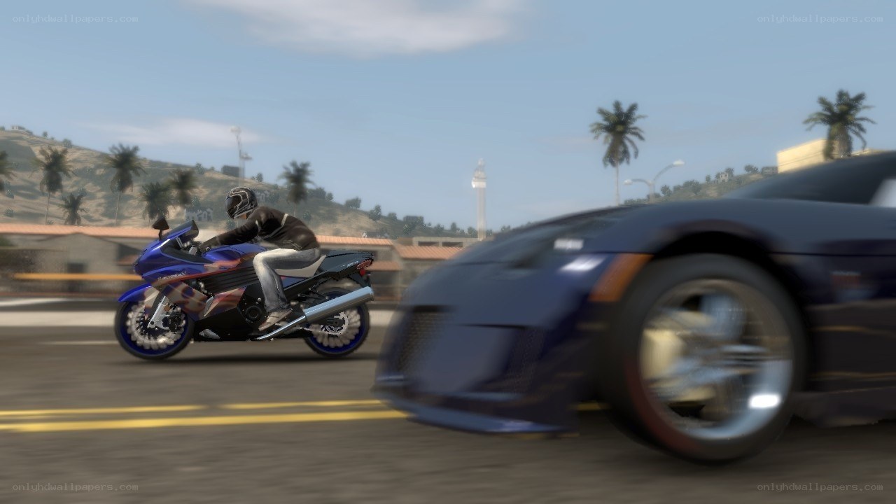 motorcycle and car on road