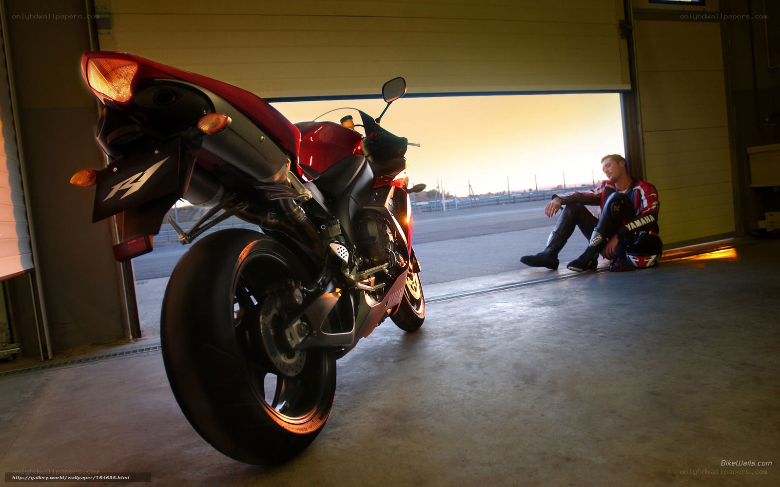 motorcycle and rider in garage