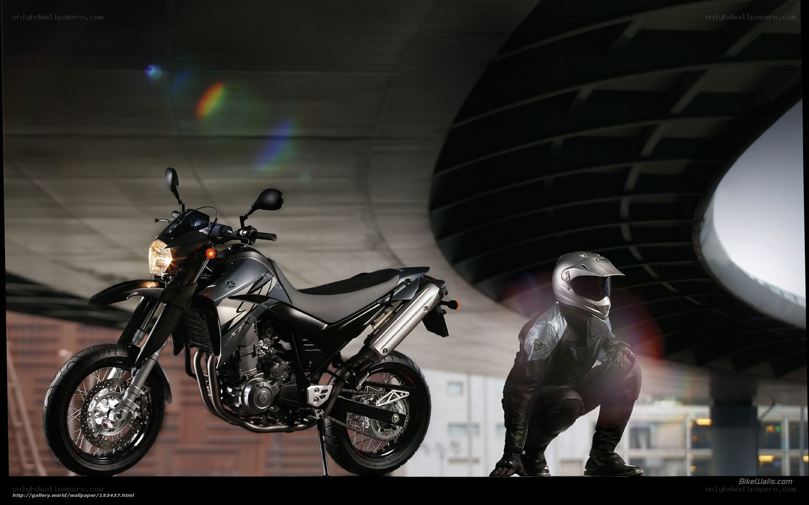 Motorcycle and rider in urban setting