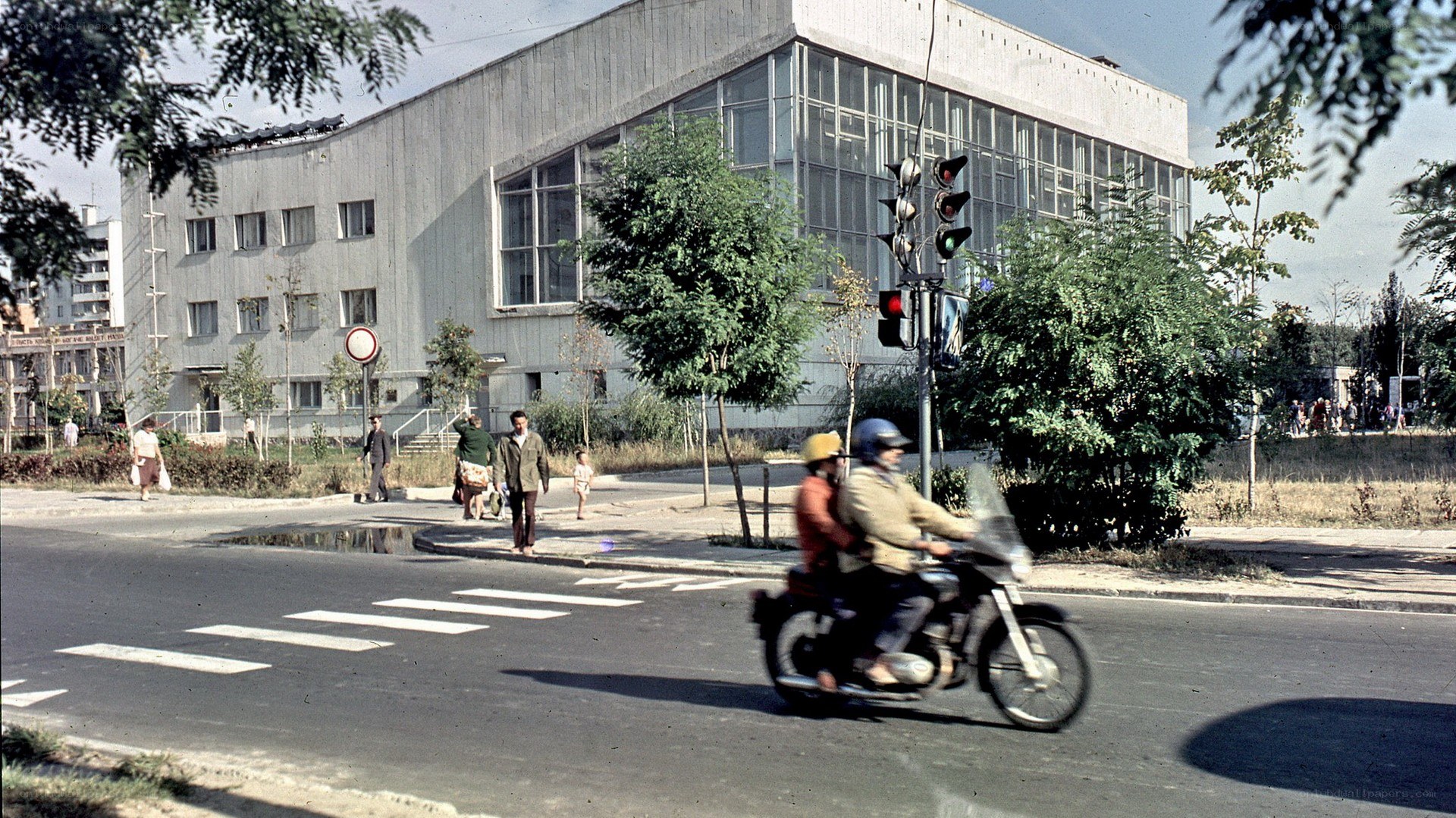 Motorcycle at crosswalk in city