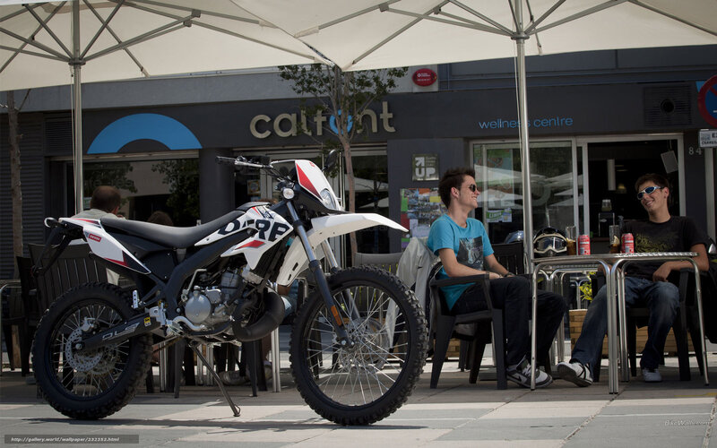 Motorcycle at outdoor cafe