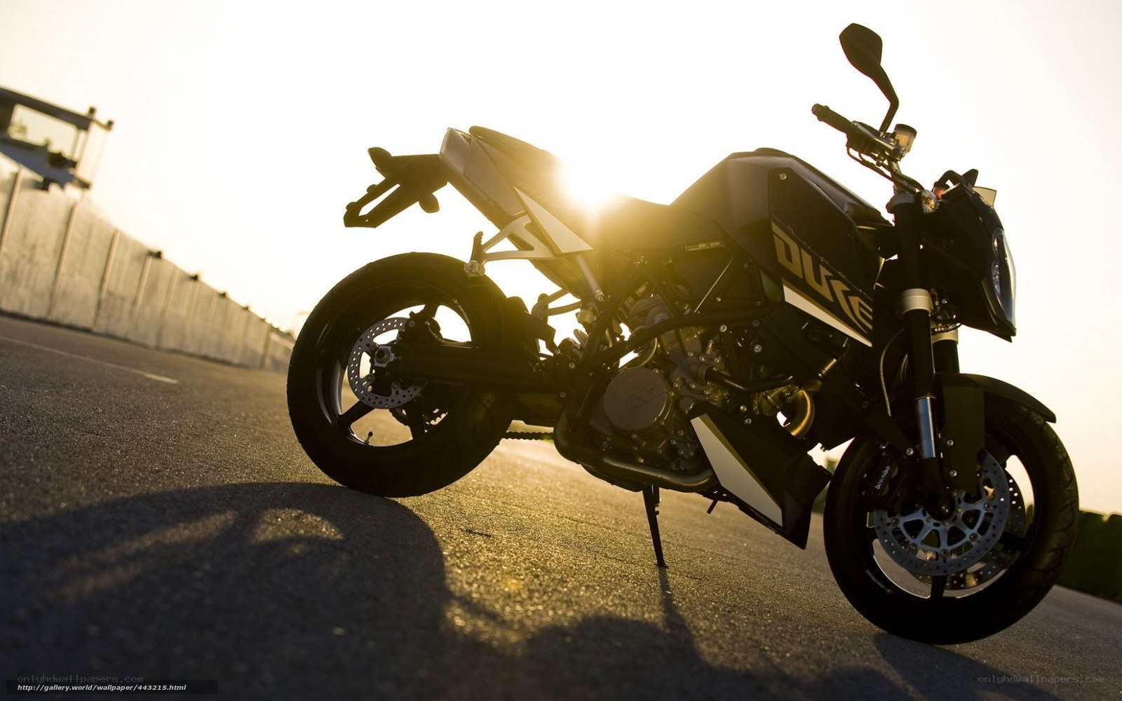 motorcycle at sunset on track