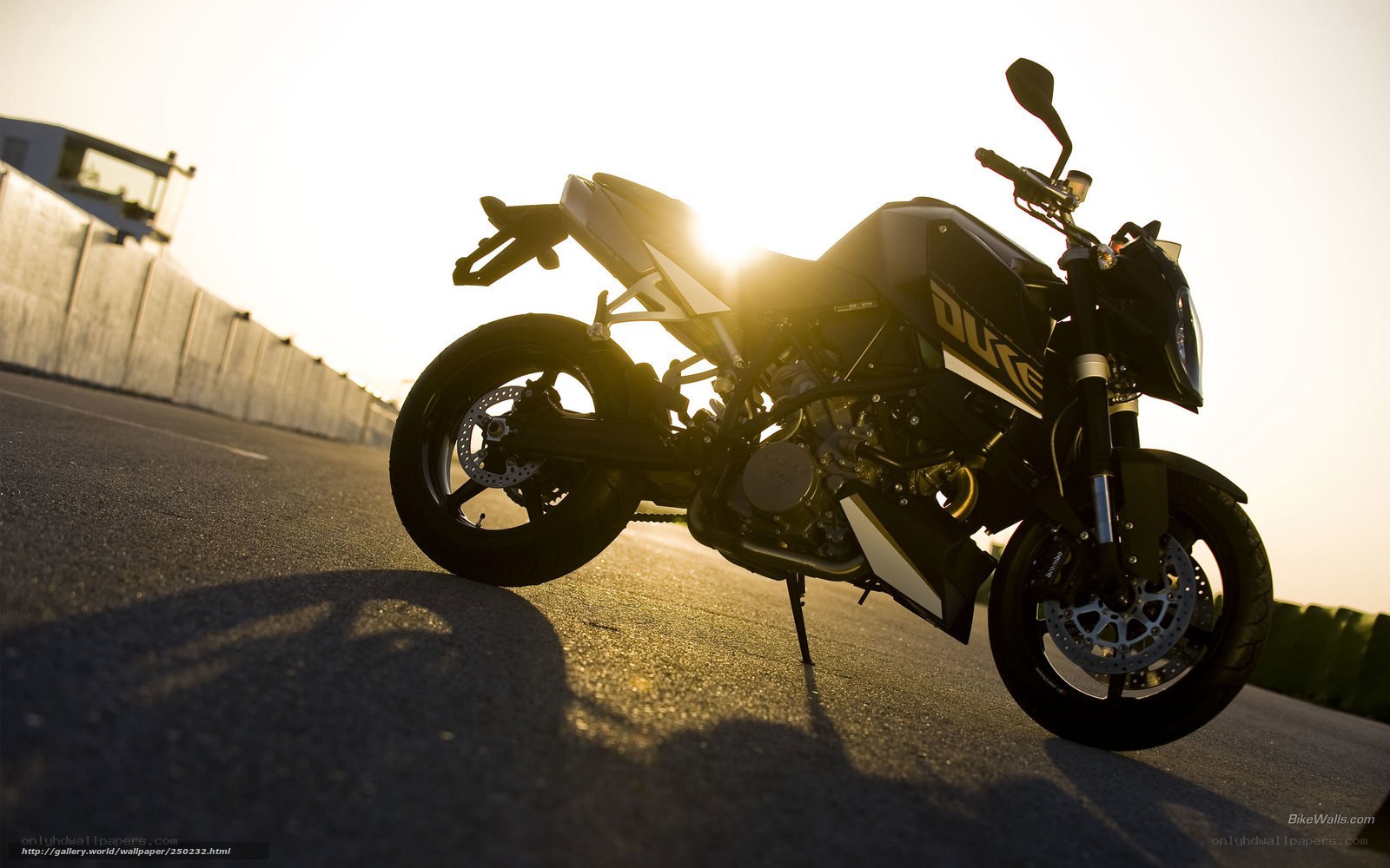 motorcycle at sunset on track