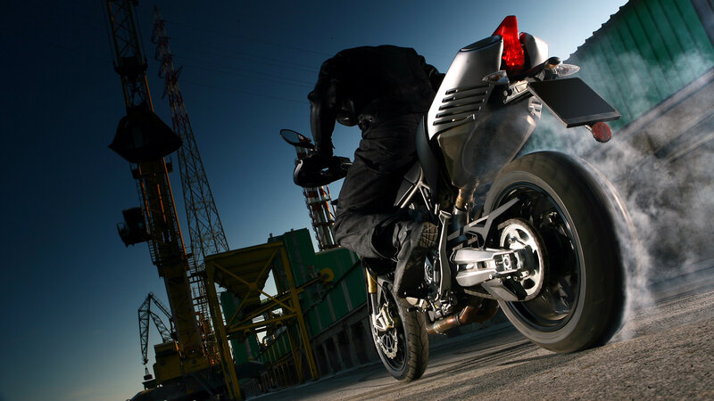 motorcycle burnout at industrial site