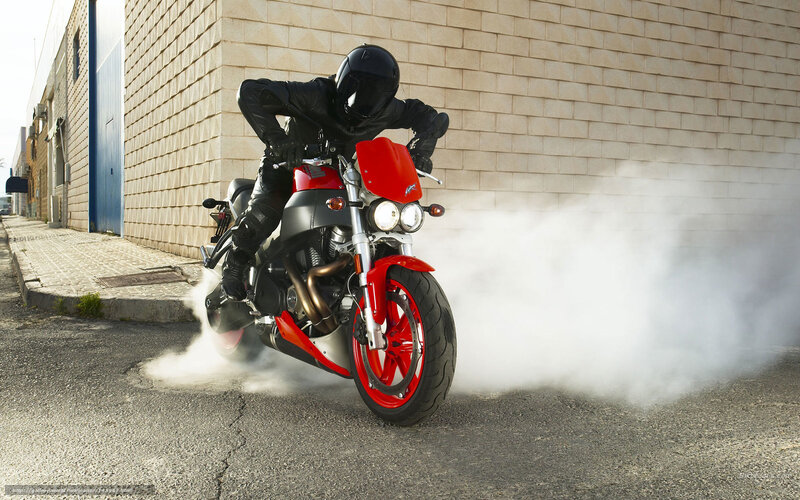 Motorcycle burnout in alley