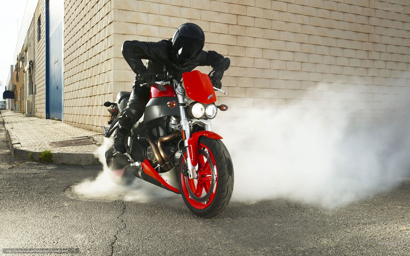 Motorcycle burnout in alley