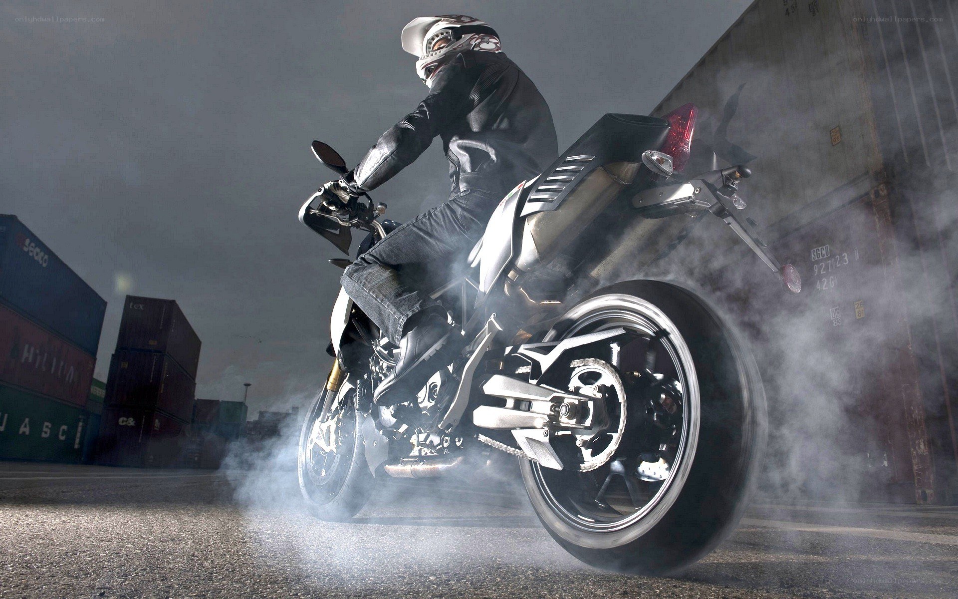 motorcycle burnout in shipping yard