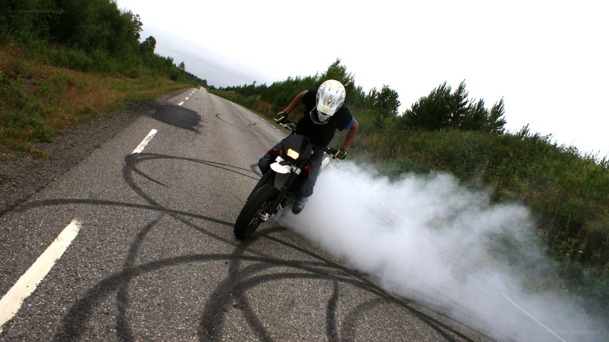 Motorcycle burnout on road