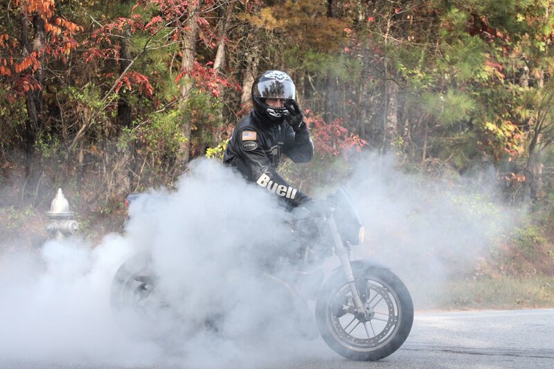 Motorcycle burnout on road