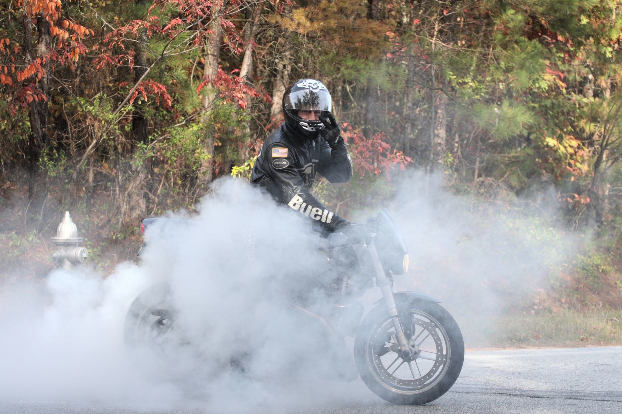 Motorcycle burnout on road