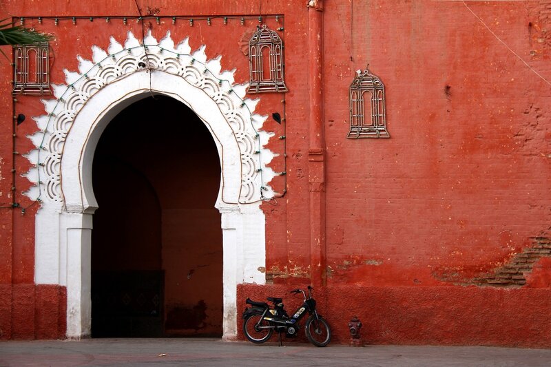 Motorcycle by Arched Gateway