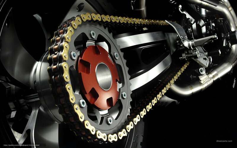 Motorcycle Chain and Sprocket — Black, Dramatic, Photograph, Exhaust Pipe