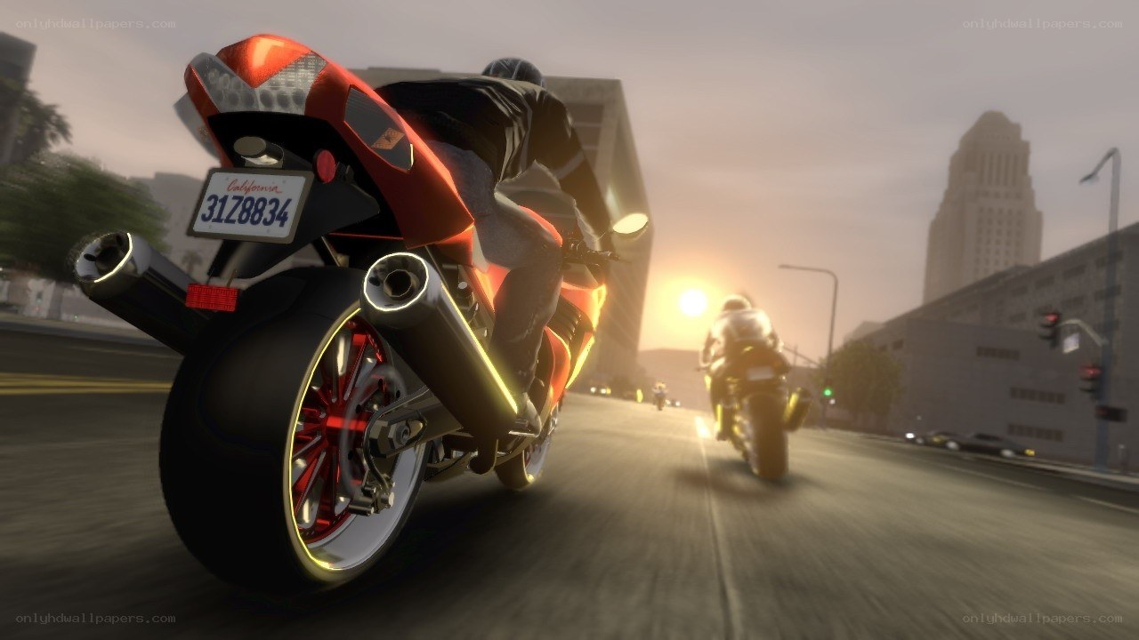 Motorcycle chase at sunset