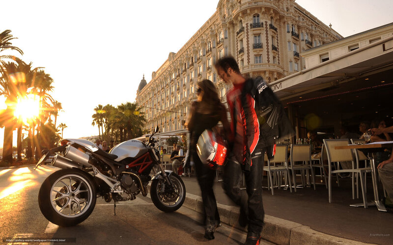 Motorcycle couple at sunset