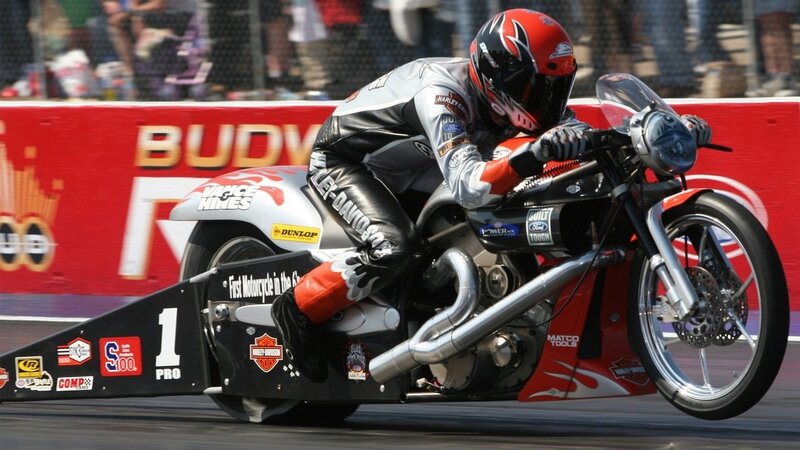 Motorcycle drag racer in action