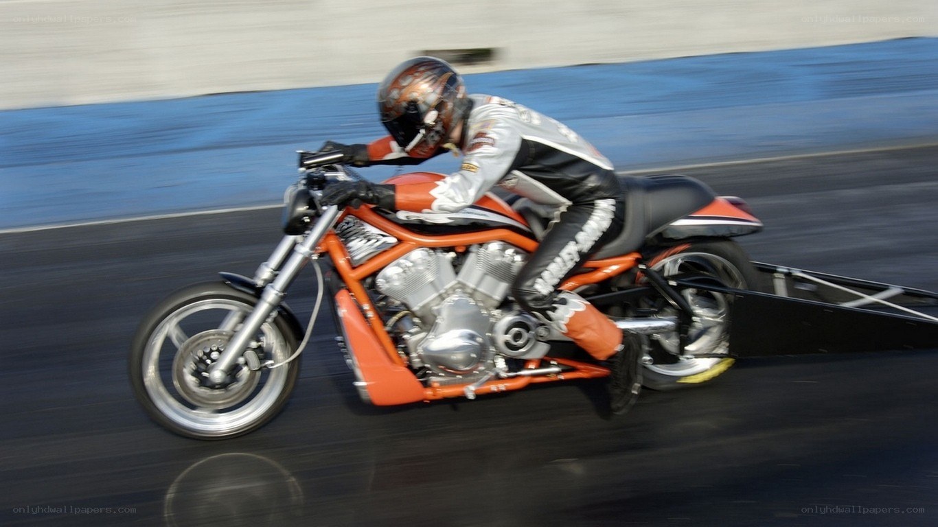 Motorcycle drag racer in action
