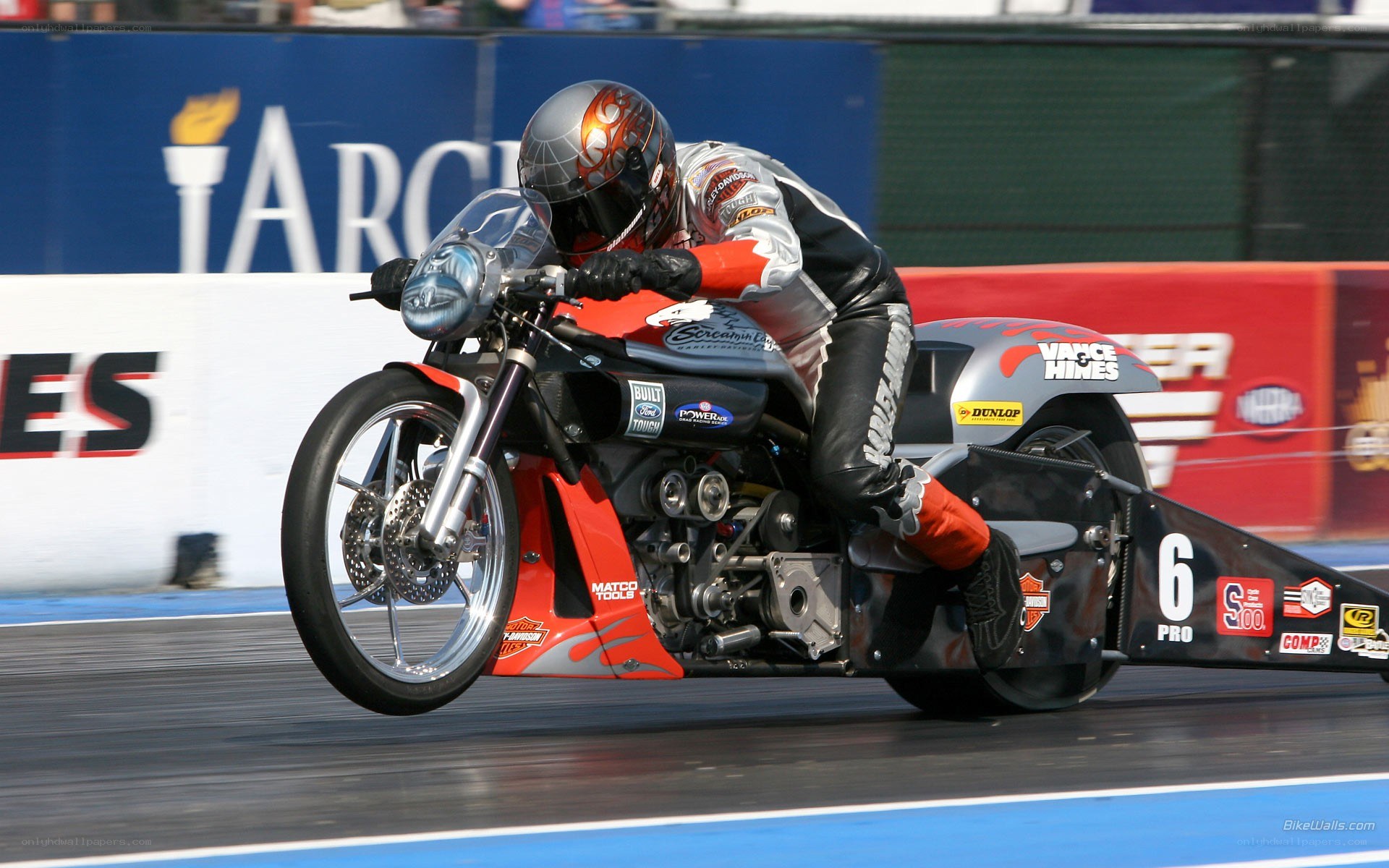 motorcycle drag racer in action