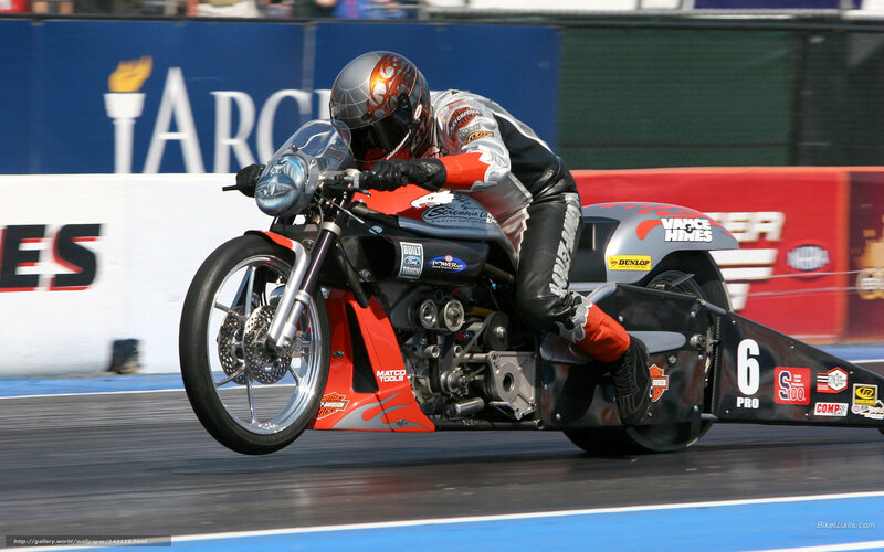 motorcycle drag racer in action