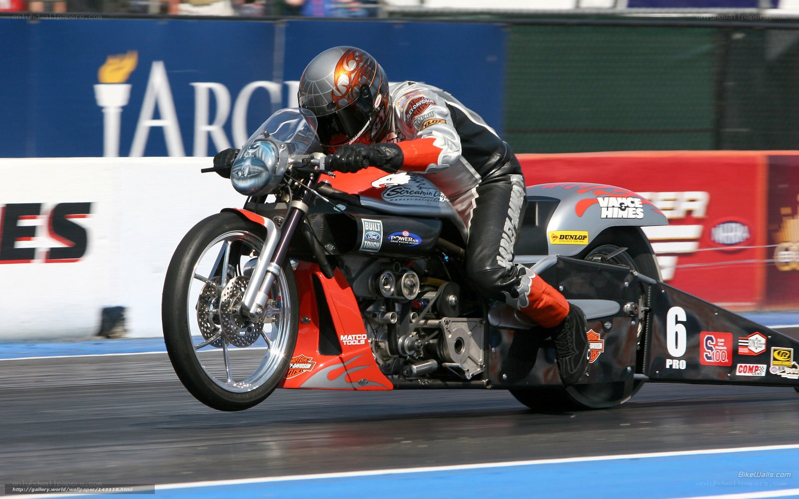 motorcycle drag racer in action