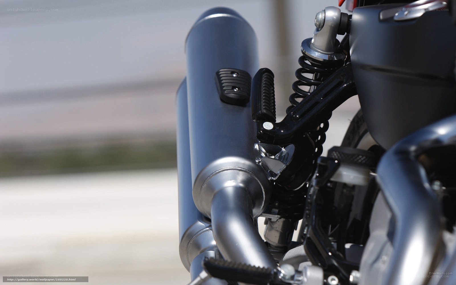motorcycle exhaust and rear suspension