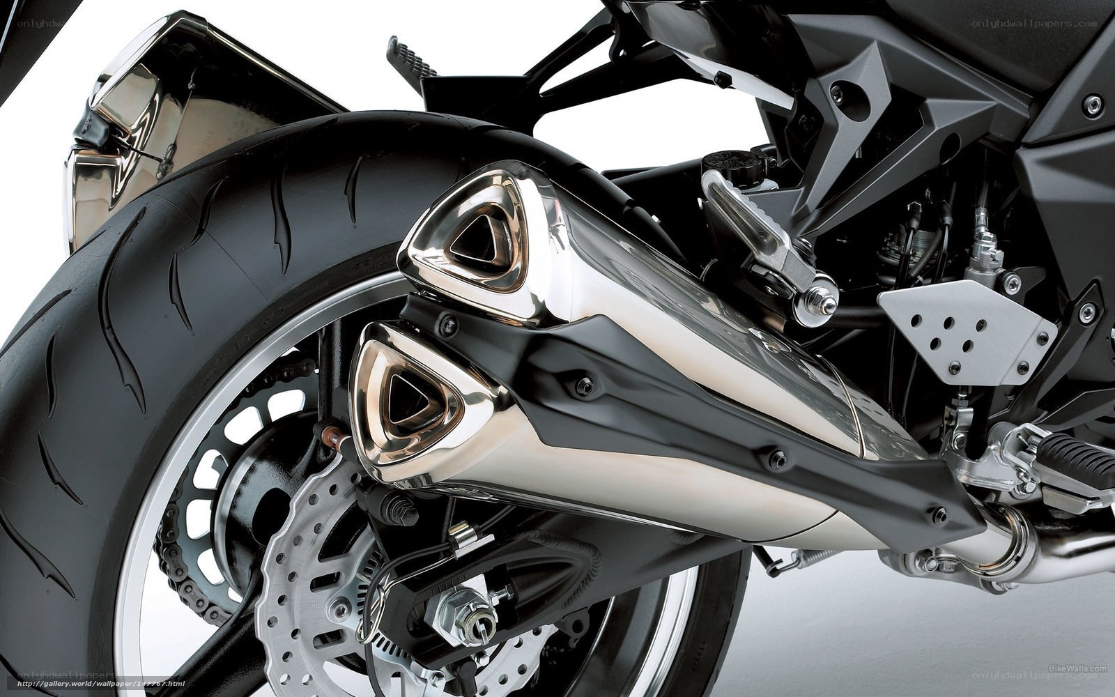 motorcycle exhaust and rear wheel