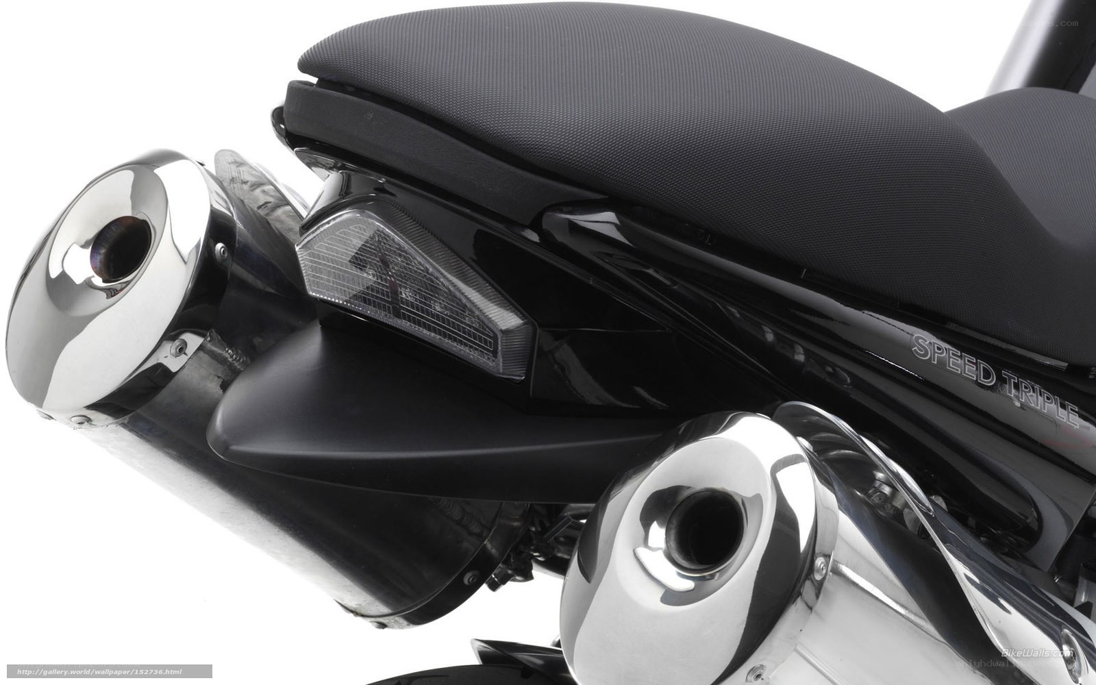 motorcycle exhaust and seat detail