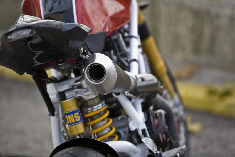 Motorcycle Exhaust and Suspension — Red