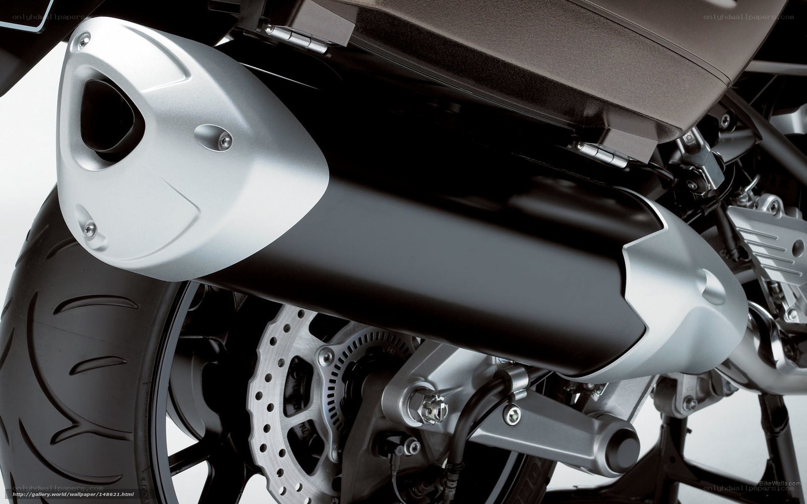 motorcycle exhaust and wheel