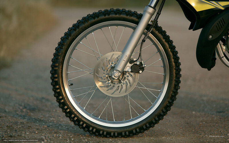 Motorcycle Front Wheel — Black, Dramatic, Sunset