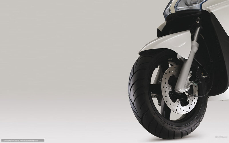 Motorcycle Front Wheel — White, Neutral, Photograph