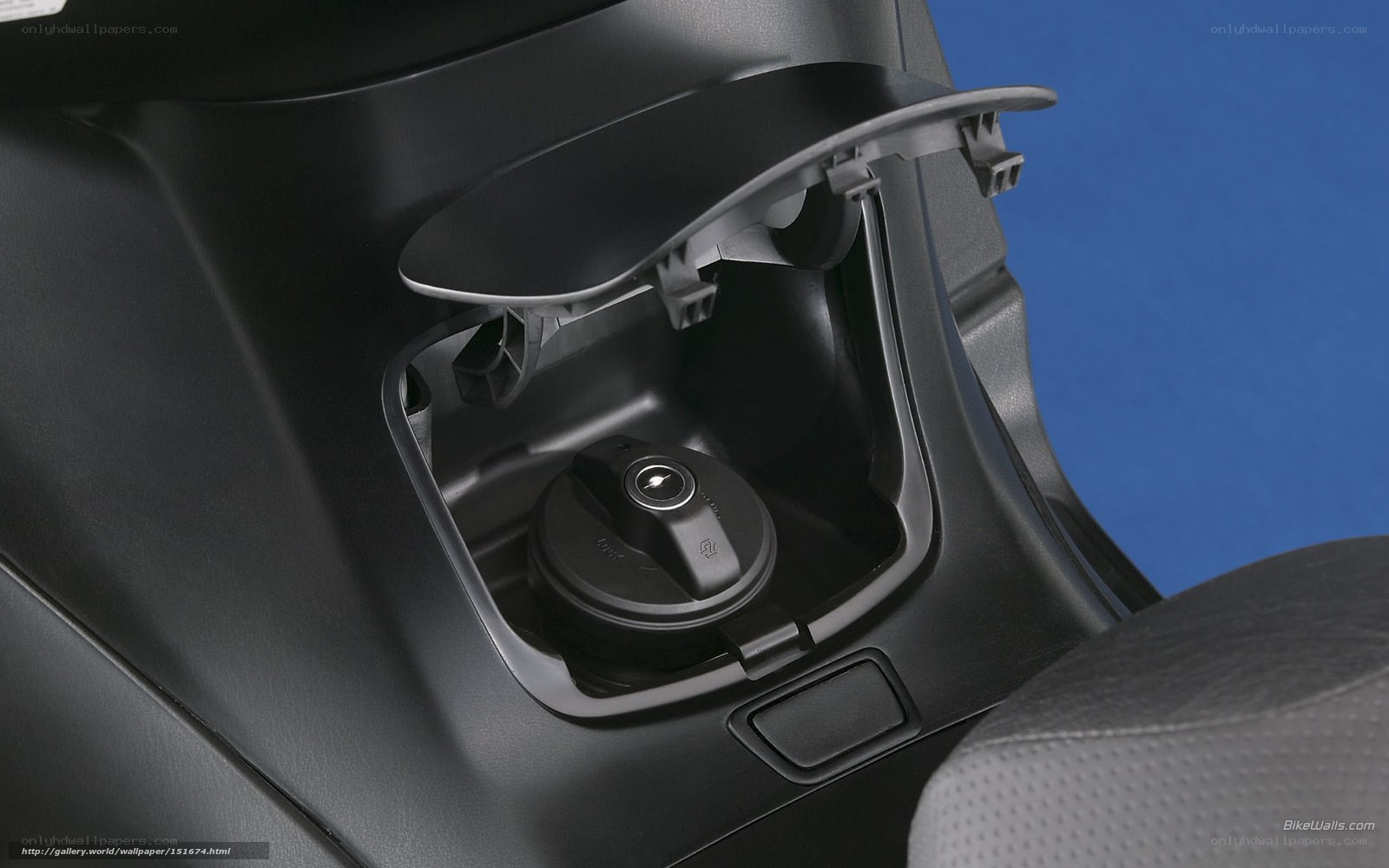 motorcycle fuel tank access
