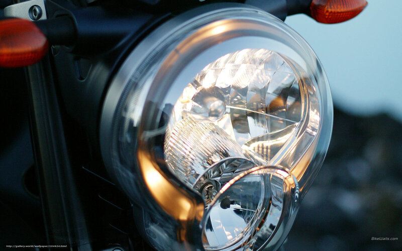 Motorcycle Headlight — Black, Dramatic, Sunset